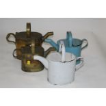 Four vintage watering cans (2 brass)