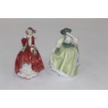 Two Royal Doulton figural ornaments,