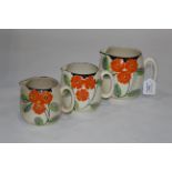 Graduated set of 3 floral jugs