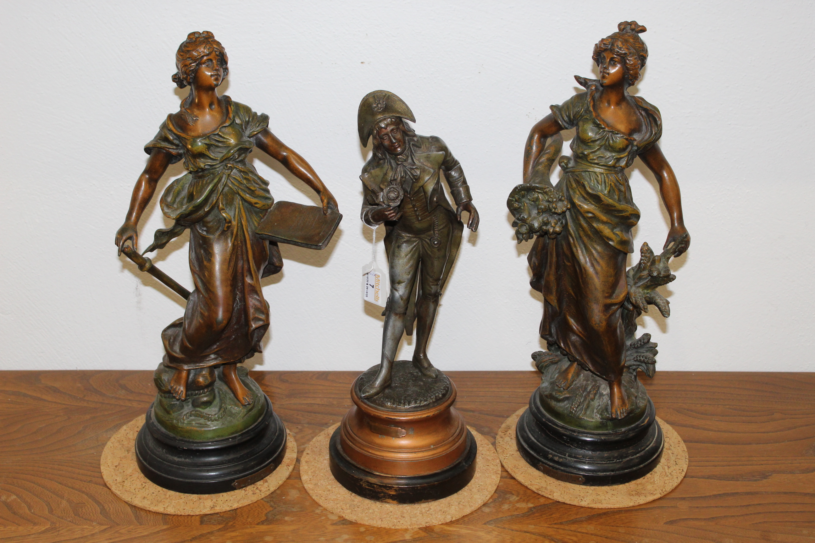 Three spelter figural ornaments,