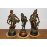 Three spelter figural ornaments,