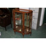 Bowfronted china display cabinet with glass shelves,