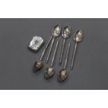 Six white metal teaspoons stamped "84" and Birmingham silver Vesta case