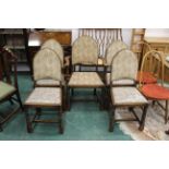 Five Gothic style oak framed chairs (1 carver,