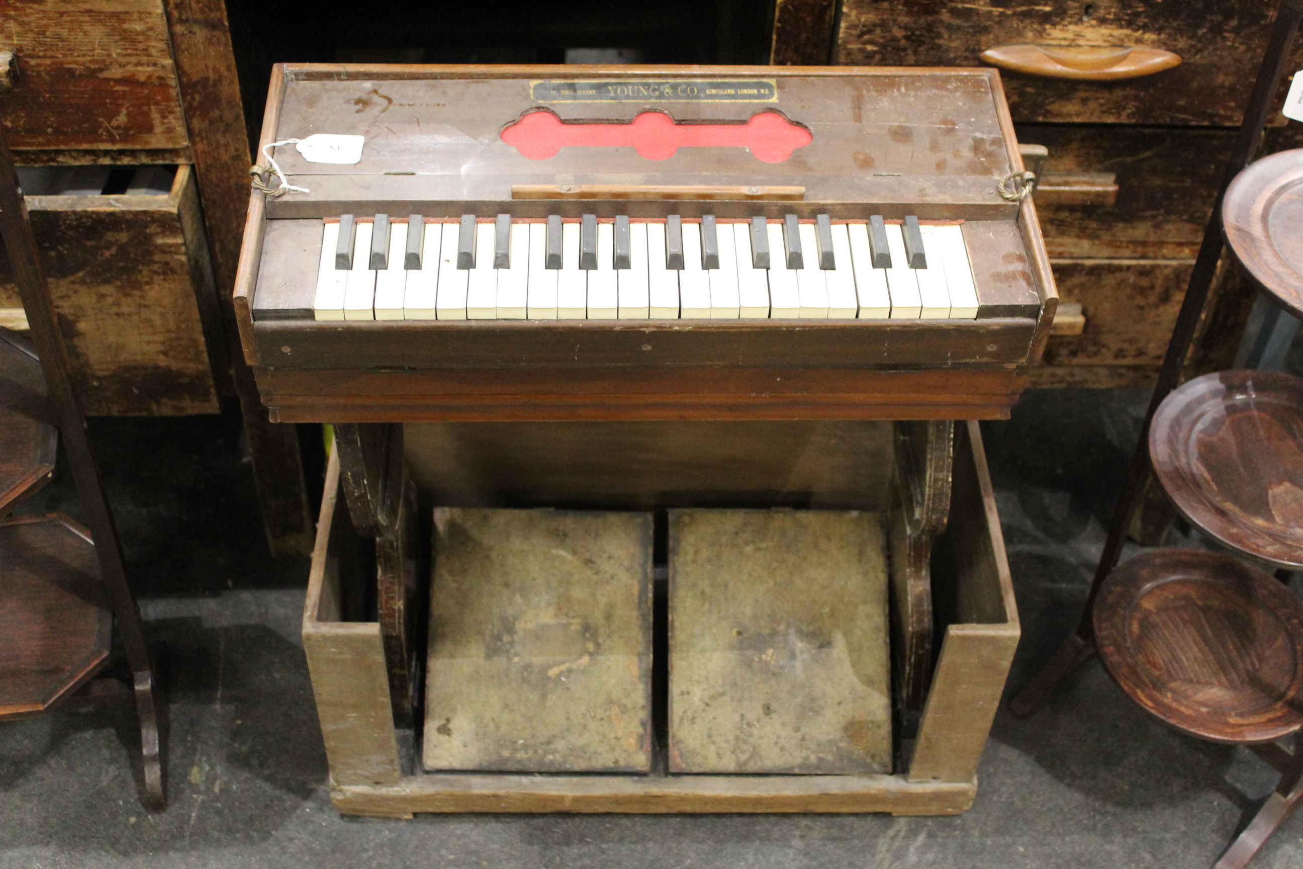 Folding travel organ by Young & Co