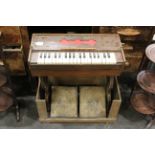 Folding travel organ by Young & Co