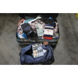 Suitcase of clothes, bag of thermal gloves,