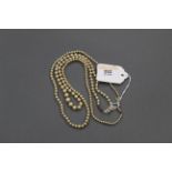 Two sets of pearl necklaces with 9 ct gold clasps