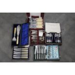 Cased cutlery, butter knives, teaspoons, desert knives and forks, fish knives and forks,