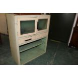 Vintage shabby chic painted kitchen unit with glass doors,