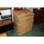 Pine slope top desk with drawer and cupboard space,