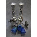 Two silver glass candlesticks,