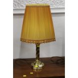 Brass effect table lamp and shade,