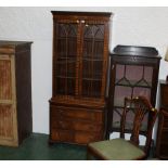 Reproduction glazed bookcase with 3 drawers to base,