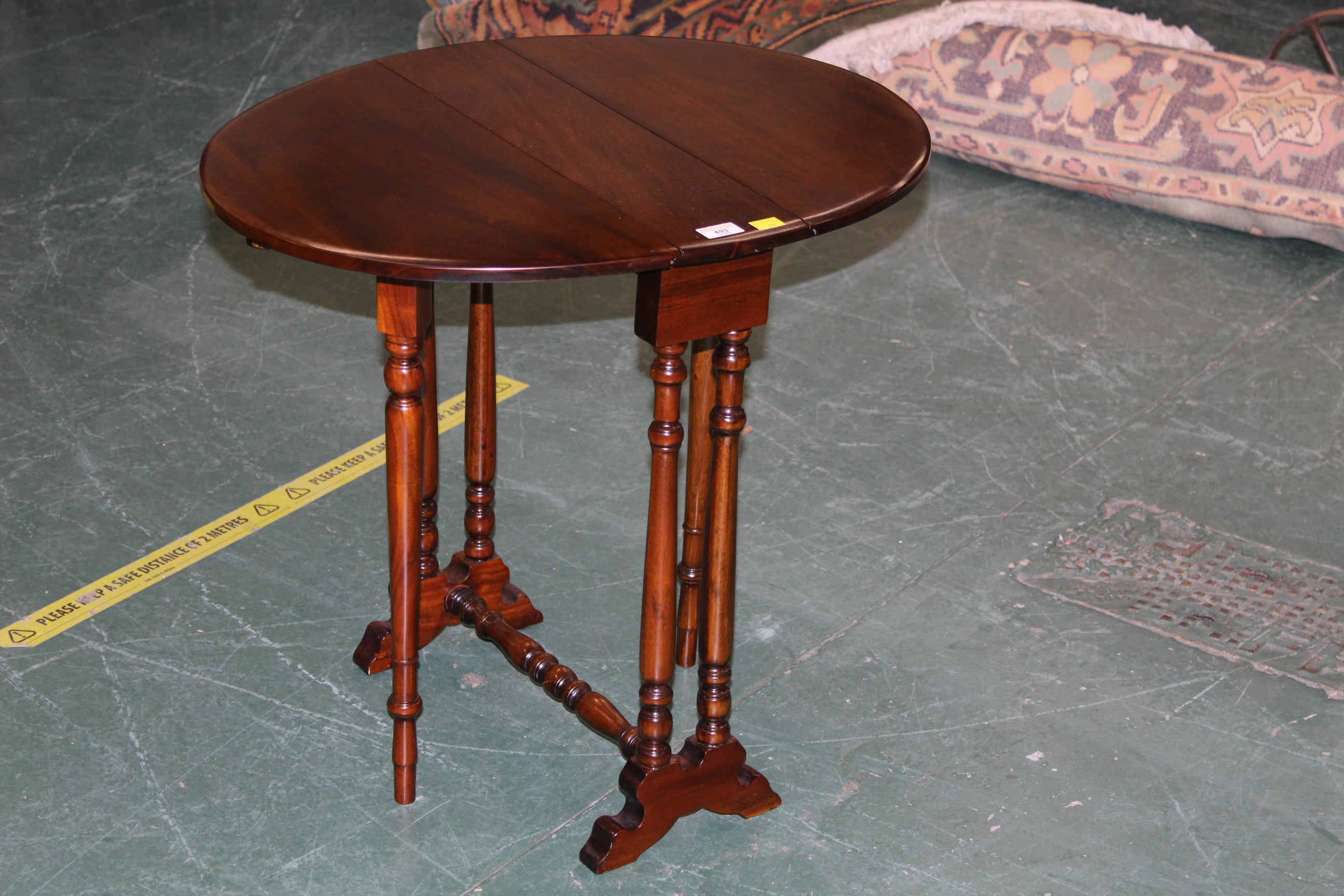 Reproduction mahogany Sutherland table,