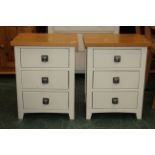 Matching pair of modern oak and white 3 drawer bedside chests,