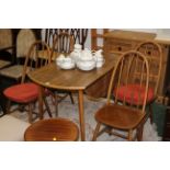 Dinette drop leaf dining table with four chairs, in the Ercol style,