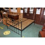 Brass and metal double bed frame with floral decoration,