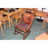 Early 20th century rocking chair with carved top rail,