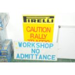 Metal Workshop No Admittance sign and Pirelli Caution Raleigh Traffic Crossing sign