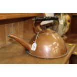 Copper kettle with ebonised and brass carrying handle,