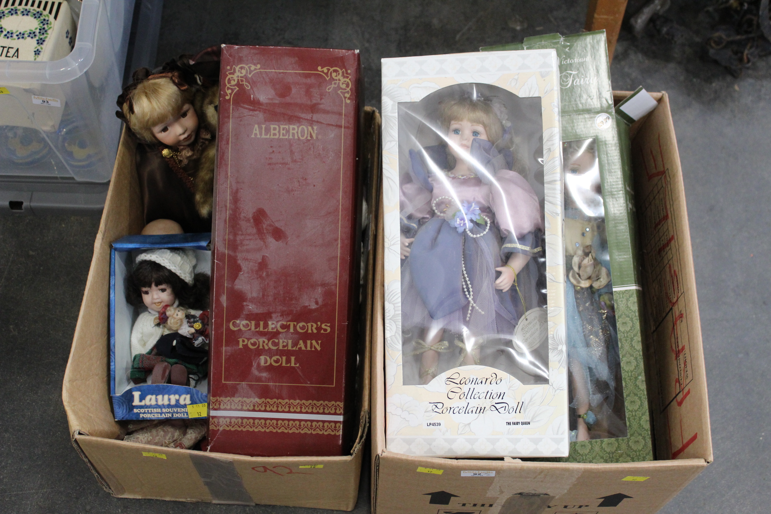 Two boxes of porcelain collectors dolls - Leonardo Collection, etc.