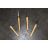 Four woodworking chisels,