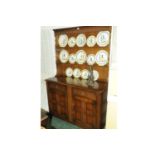 Priory oak dresser with Delft rack above a pair of drawers and pair of cupboard doors