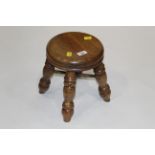 Polished 4 legged circular stool,