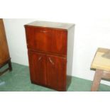 1950's walnut cocktail cabinet with fold down front and lift up top opening to mirrored interior