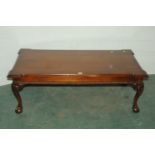 Modern mahogany rectangular coffee table with claw and ball feet, 122 x 62 cm,