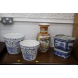 Two blue and white Portuguese floral patterned planters,