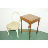 Walnut quarter veneered occasional table and white painted chair with upholstered seat