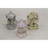 Three Regency Fine Art ornaments to include 2 merry go rounds and big wheel