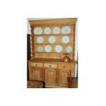 Large pine dresser with Delft rack, 3 drawers and 3 cupboards, height 223 cm, width 160 cm,