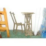 Pair of cast iron bench ends and pair of cast iron table legs