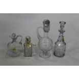 Four glass decanters,