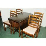 Ercol style drop leaf table and four ladderback chairs