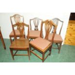 Five oak chairs