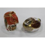 Two Royal Crown Derby bird ornaments/paperweights both with gold coloured stoppers