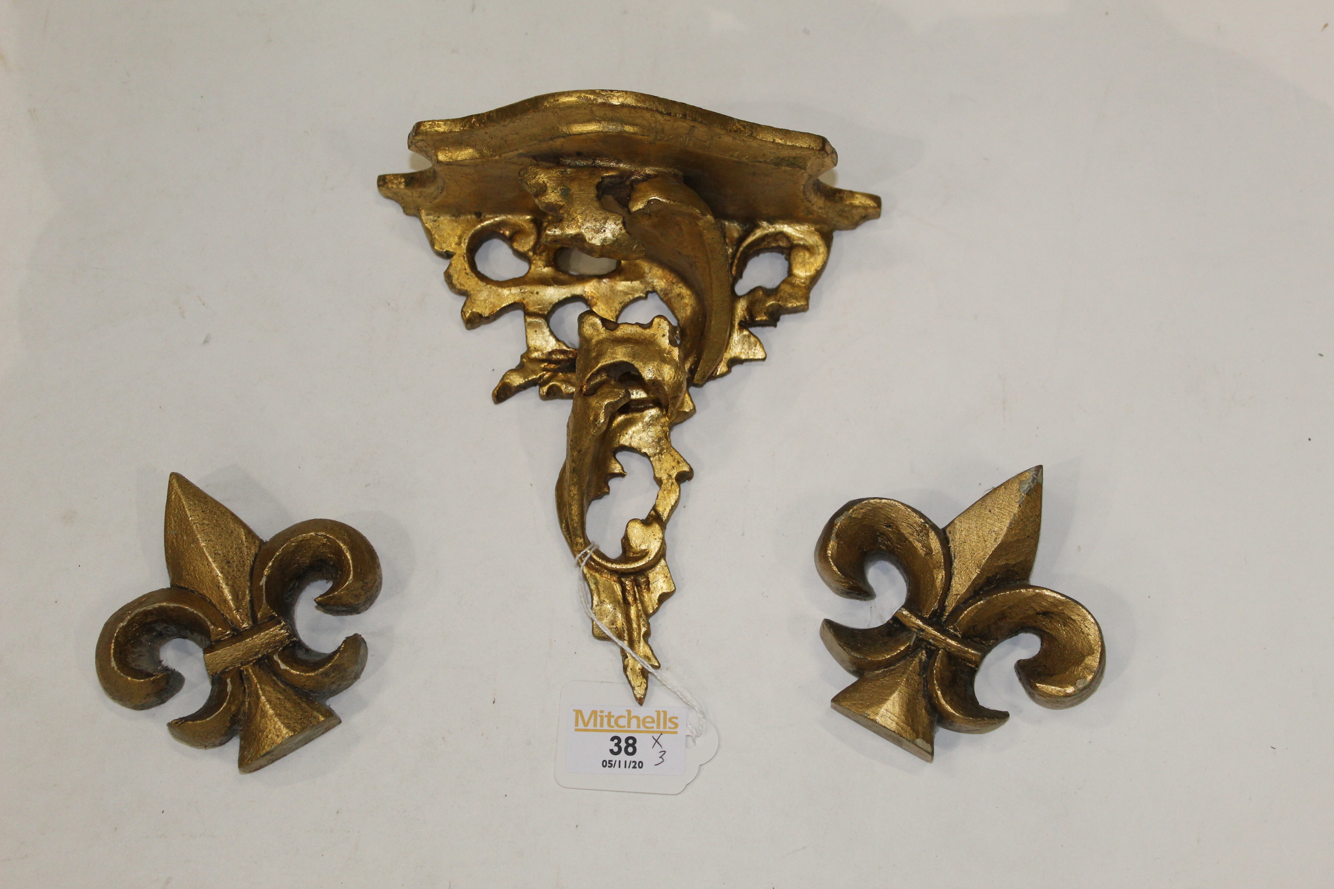 Italian made giltwood corbal/shelf and two gilt Fleur de Lis