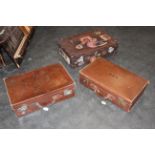 Three vintage suitcases