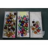 Three boxes of Xmas decorations including miniature baubles