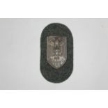 20th Century Nazi Germany "Cholm 1942" shield with eagle and swastika decoration,