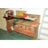 Myford Mystro woodturning lathe mounted on a pine bench with various drawers,