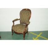 Victorian mahogany nursing chair with floral upholstered back,