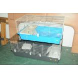 Two large pet cages,