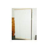 Three white and beech effect wardrobes