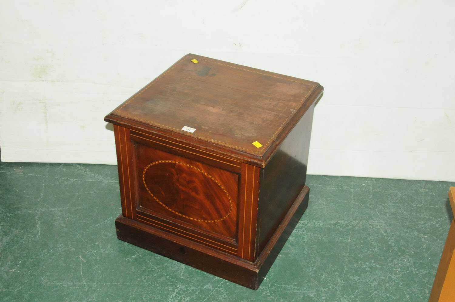 Edwardian inlaid cupboard with lift up top