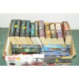 Box of books to include Wilbur Smith,